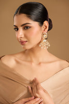 A classic silhouette elevated gold-plated danglers adorned