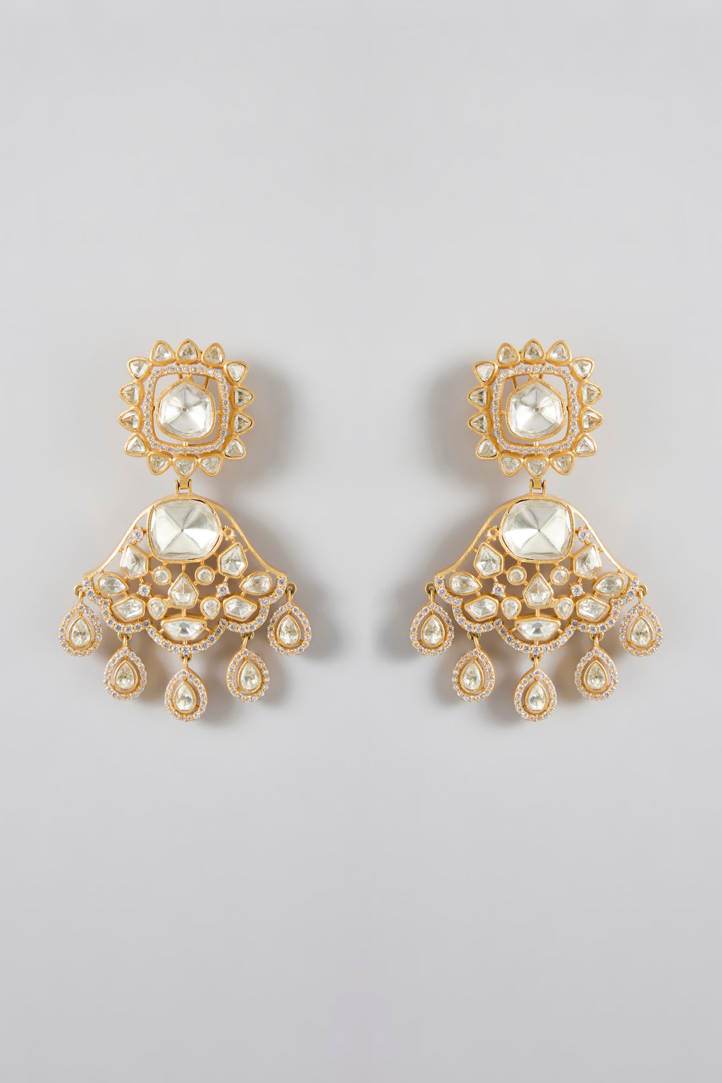 A classic silhouette elevated gold-plated danglers adorned